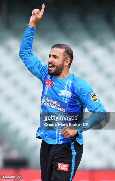 Fawad Ahmed of the Strikers celebrates the wicket of Daniel Hughes of the Sixers during the Men's Big Bash League match between the Adelaide Strikers...