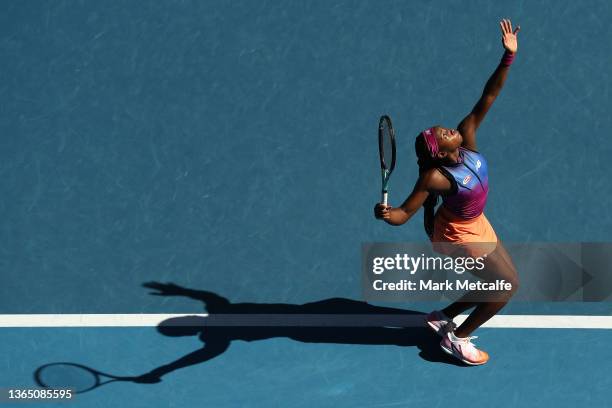 Coco Gauff of United States serves in her first round singles match against Qiang Wang of China during day one of the 2022 Australian Open at...