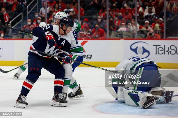 Washington Capitals center Nicklas Backstrom looks for a rebound during a game against the Vancouver Canucks at Capital One Arena on January 16, 2022...