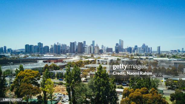 aerial view of melbourne city skyline and port melbourne industrial district, on a sunny day - melbourne property imagens e fotografias de stock