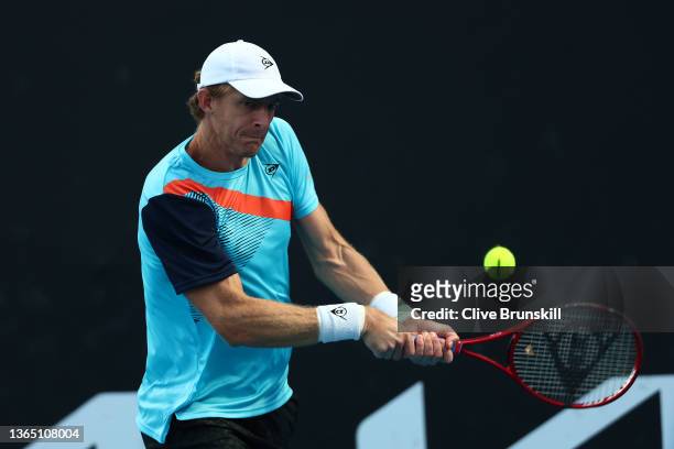 Kevin Anderson of South Africa plays a backhand in his first round singles match against Reilly Opelka of United States during day one of the 2022...