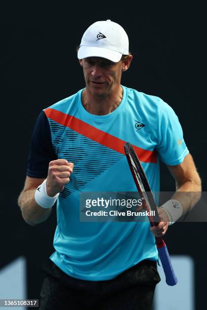 Kevin Anderson of South Africa reacts in his first round singles match against Reilly Opelka of United States during day one of the 2022 Australian...