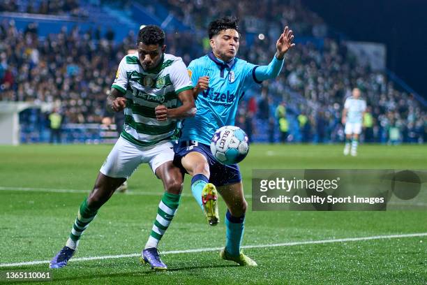 Matheus Reis of Sporting CP competes for the ball with Alex Mendez of FC Vizela during the Liga Portugal Bwin match between FC Vizela and Sporting CP...