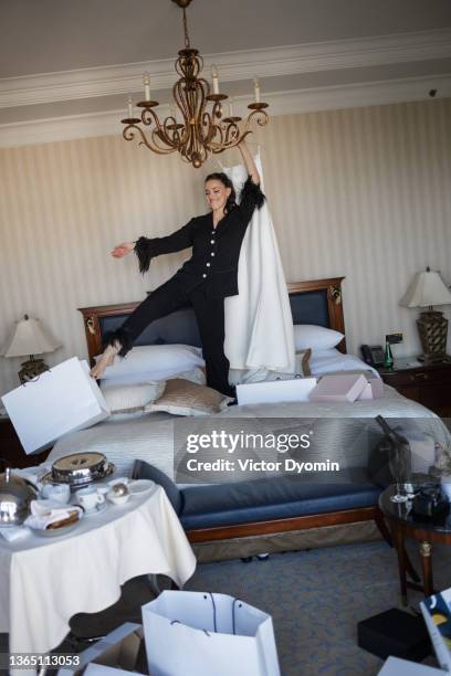 happy young bride in her bedroom before wedding - naughty bride fotografías e imágenes de stock