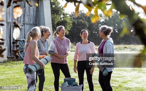 winding down after fitness class - only mature women stock pictures, royalty-free photos & images