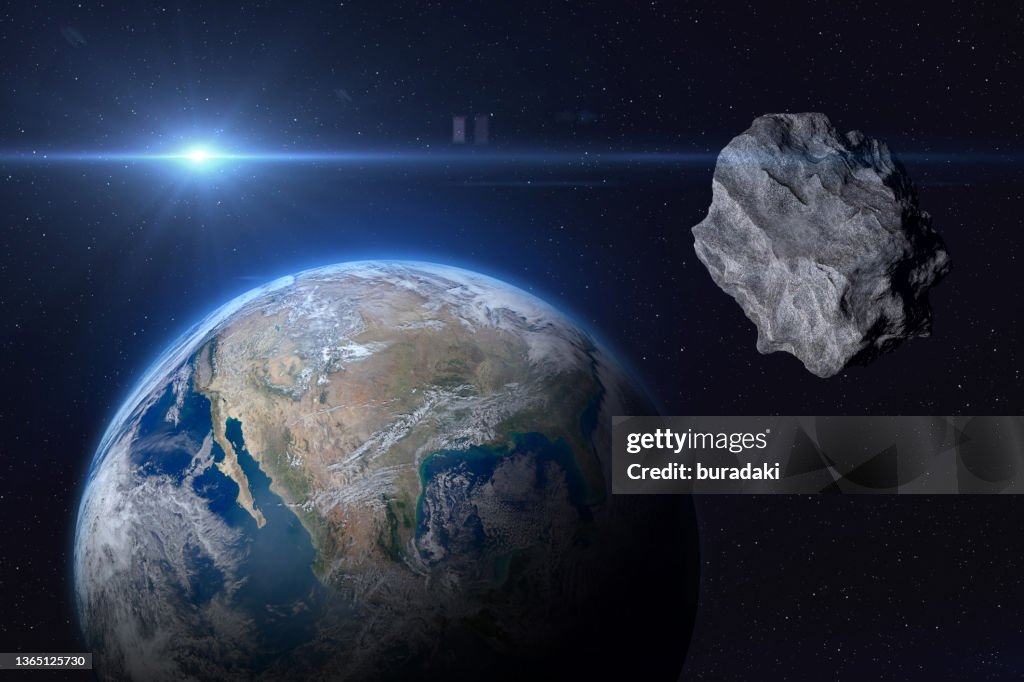 Planet Earth and asteroid.