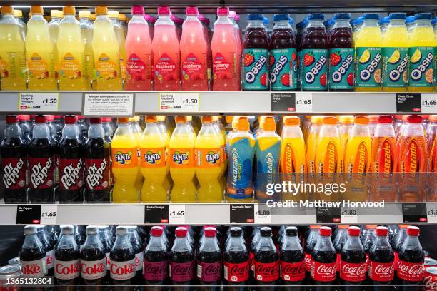 Bottles of fizzy drinks on sale in a supermarket on January 10, 2022 in Cardiff, Wales.