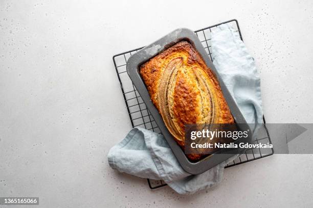 crispy baked banana bread. sweet homemade pastry. fragant delicious fruitcake. top view copy space - fruitcake stock pictures, royalty-free photos & images