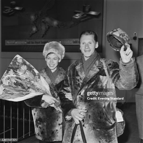 Russian pair skater Oleg Protopopov with his wife Ludmila Belousova , after they won a gold medal for the Soviet Union at the 1964 Winter Olympics at...