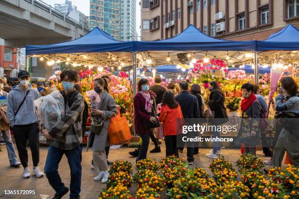 mong kok flower market in hong kong - kowloon stock pictures, royalty-free photos & images