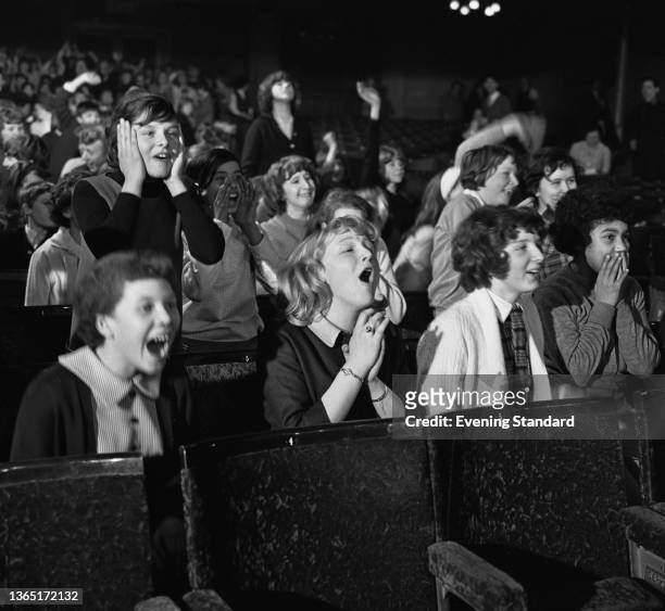 Beatles fans at the Scala Theatre in Charlotte Street, London, to film a concert sequence for the Beatles film 'A Hard Day's Night', UK, 31st March...