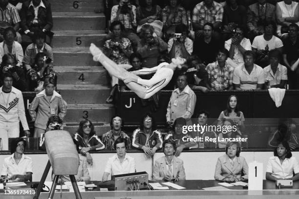 Romanian gymnast Nadia Comaneci wins a gold medal at the 1976 Summer Olympics in Montreal, Canada, 26th July 1976.