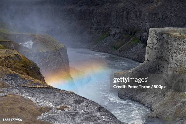 dettifoss canyon rainbow,scenic view of waterfall,dettifoss,iceland - dettifoss waterfall foto e immagini stock