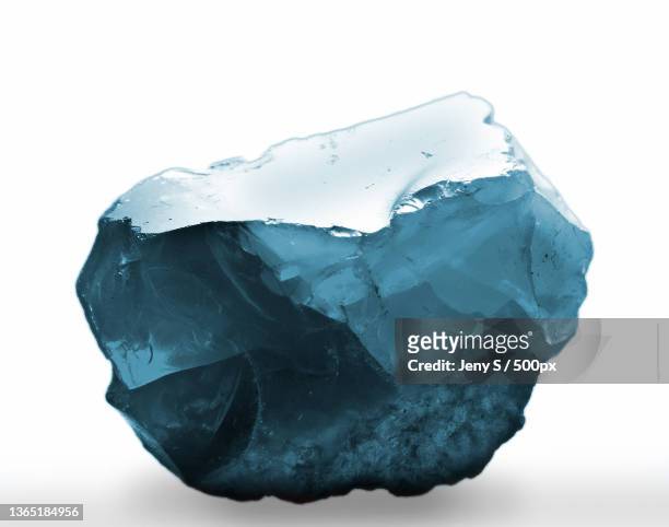 stock photo,close-up of ice against white background - sapphire stone stock pictures, royalty-free photos & images