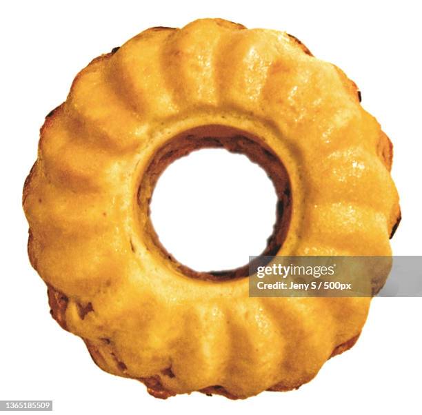 close-up of donut against white background - backery fotografías e imágenes de stock