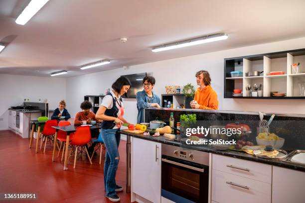 cooking in the common room - sunderland university stock pictures, royalty-free photos & images