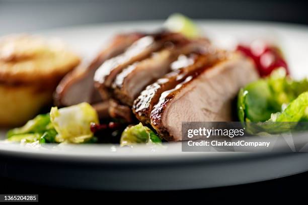 roasted duck breast - duck meat stock pictures, royalty-free photos & images