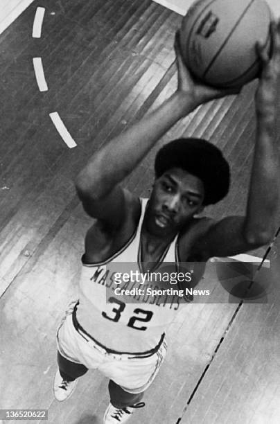 Julius Erving of the Massachusetts Minutemen poses for a portrait circa 1970 at the Curry Hicks Cage in Amherst, Massachusetts.