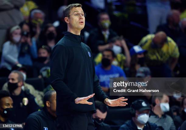 Associate head coach Jon Scheyer of the Duke Blue Devils directs his team against the Wake Forest Demon Deacons during their game at Lawrence Joel...