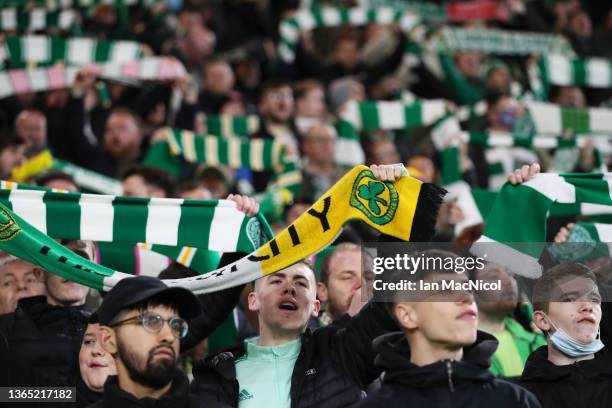 Fans show their support before the start of the Cinch Scottish Premiership match between Celtic FC and Hibernian FC at on January 17, 2022 in...