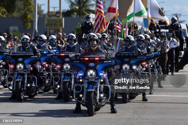 City of Miami police participate in the Dr. Martin Luther King Jr. Day Parade as it winds through the streets of the Liberty City neighborhood on...