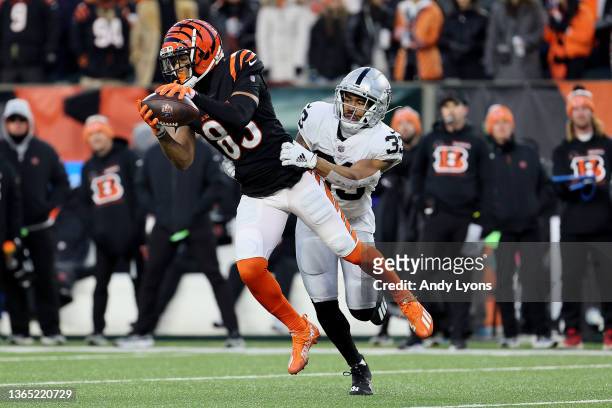 Wide receiver Tyler Boyd of the Cincinnati Bengals catches a second quarter pass in front of safety Roderic Teamer of the Las Vegas Raiders during...