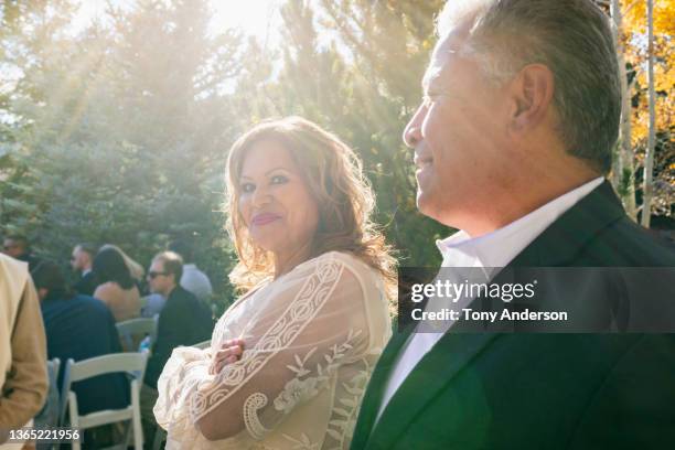 wedding guests awaiting ceremony - couple before marriage stock-fotos und bilder