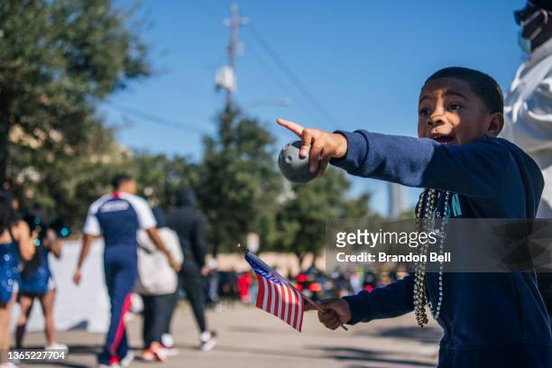Jamal Ali express excitement while watching the 28th Annual Martin Luther King Jr. Grande Parade on January 17, 2022 in Houston, Texas. Community...