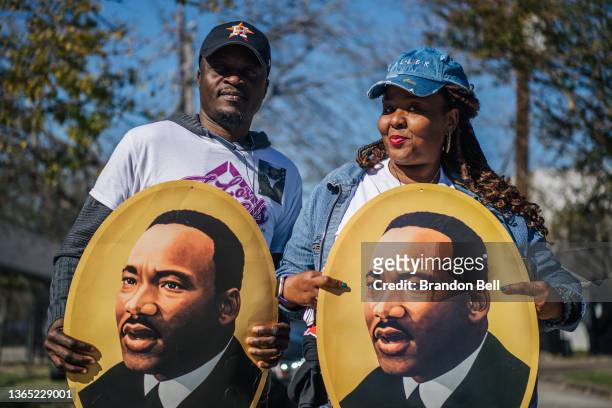 Busayo Taiwo and his wife Lonneka pose for a portrait during the 28th Annual Martin Luther King Jr. Grande Parade on January 17, 2022 in Houston,...