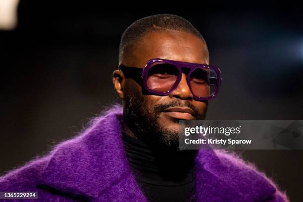 Djibril Cissé walks the runway during the Gunther Menswear Fall/Winter 2022-2023 show as part of Paris Fashion Week on January 17, 2022 in Paris,...