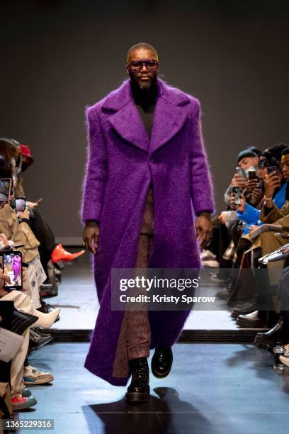 Djibril Cissé walks the runway during the Gunther Menswear Fall/Winter 2022-2023 show as part of Paris Fashion Week on January 17, 2022 in Paris,...