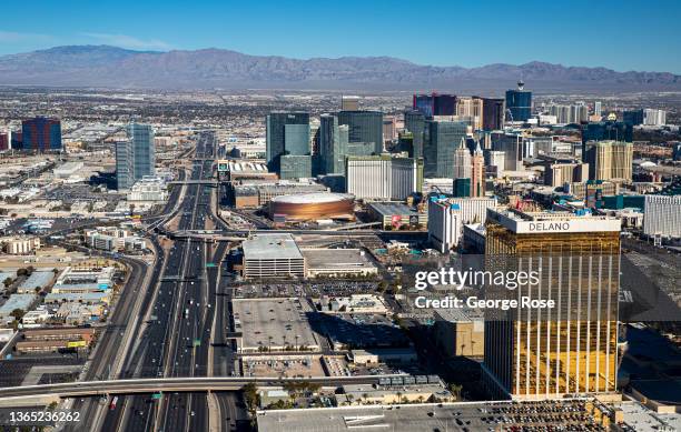 Hotels and attractions, including The Delano and Excalibur Hotels & Casinos, and T-Mobile Arena, along the Las Vegas Strip are viewed looking north...