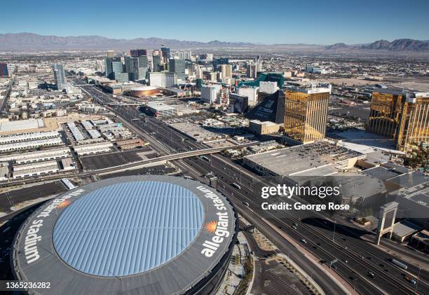 Allegiant Stadium, home to the Las Vegas Raiders and located just west of Interstate 15 and the Mandalay Hotel & Casino, is viewed looking north from...