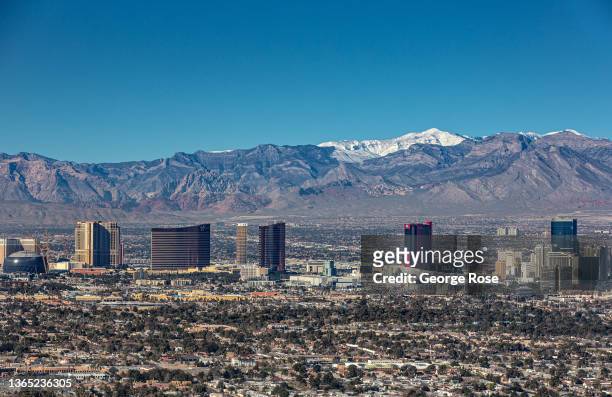 Hotels, casinos, and attractions along the Las Vegas Strip are viewed looking west toward Red Rock Canyon National Conservation Area from the air on...