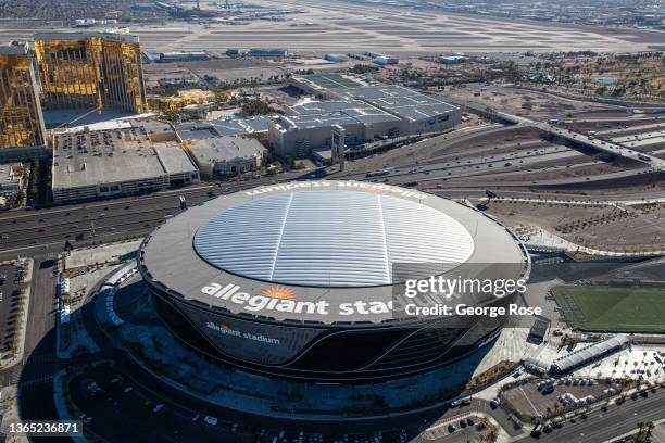Allegiant Stadium, home to the Las Vegas Raiders and located just west of Interstate 15 and the Mandalay Hotel & Casino, is viewed from the air on...