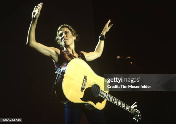 Sheryl Crow performs during the Lilith Fair at Shoreline Amphitheatre on July 14, 1999 in Mountain View, California.