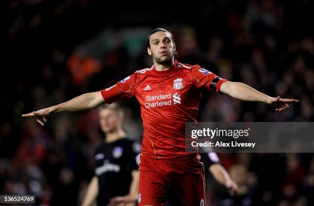 Andy Carroll of Liverpool celebrates scoring his team's fourth goal during the FA Cup 3rd Round match between Liverpool and Oldham Athletic at...