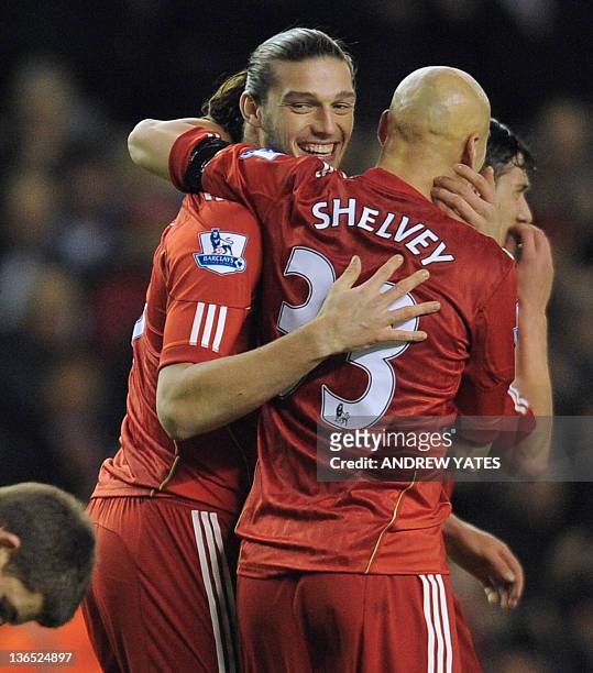 Liverpool's English forward Andy Carroll celebrates with his teammate English midfielder Jonjo Shelvey after scoring during the FA Cup football match...