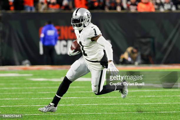 DeSean Jackson of the Las Vegas Raiders runs with the ball in the third quarter against the Cincinnati Bengals during the AFC Wild Card playoff game...