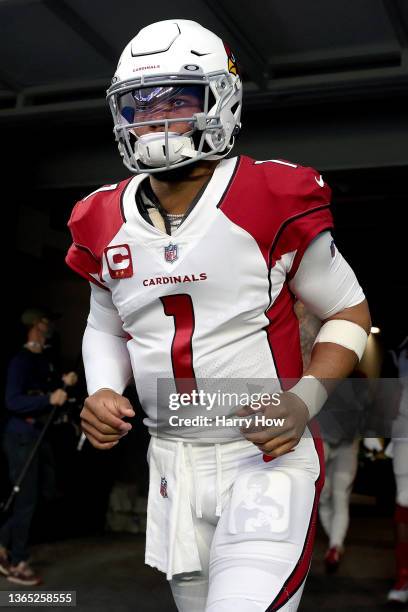 Kyler Murray of the Arizona Cardinals enters the field for warmups before the game against the Los Angeles Rams in the NFC Wild Card Playoff game at...