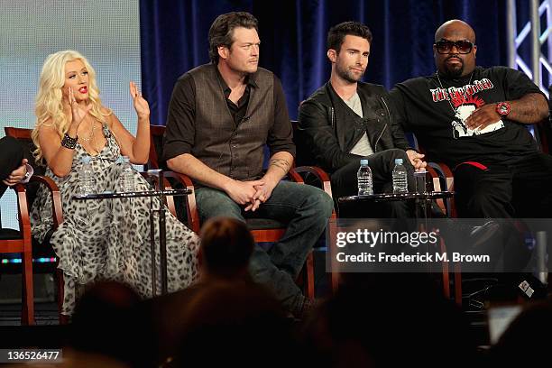 Coach Christina Aguilera, Coach Blake Shelton, Coach Adam Levine and Coach Cee Lo Green speak onstage during the "The Voice" panel during the...