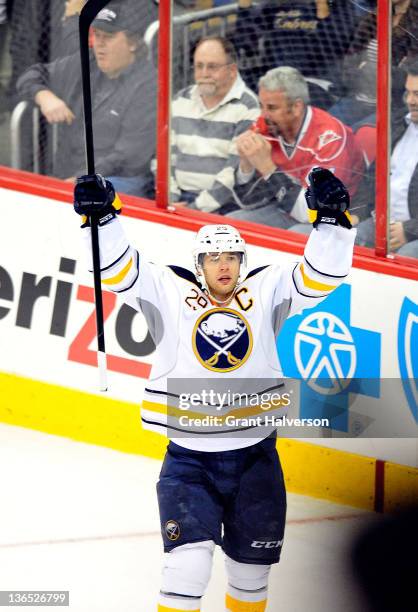 Jason Pominville of the Buffalo Sabres reacts after scoring a goal against the Carolina Hurricanes during the third period at the RBC Center on...