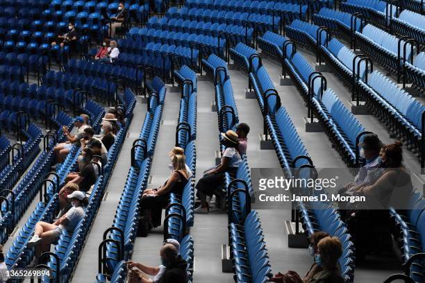 Spectators sit inside Rod Laver Arena during day two of the 2022 Australian Open at Melbourne Park on January 18, 2022 in Melbourne, Australia.