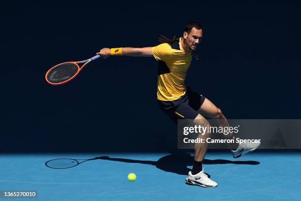 Gianluca Mager of Italy plays a backhand in his first round singles match against Andrey Rublev of Russia during day two of the 2022 Australian Open...