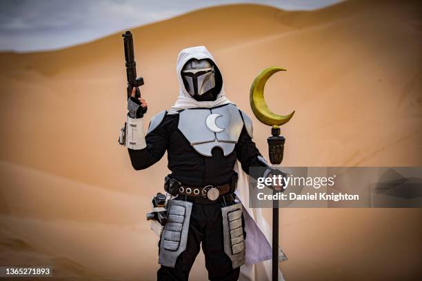 Star Wars cosplayer Derek Shackelton as a Mandalorian/Moon Knight mashup named "Moondalorian" poses for photos at Buttercup Sand Dunes on January 15,...