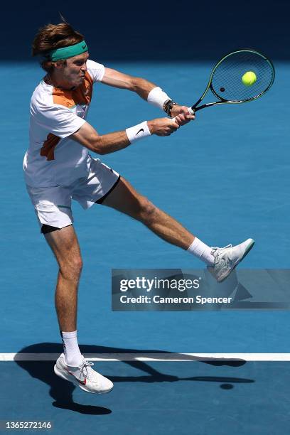 Andrey Rublev of Russia plays a backhand in his first round singles match against Gianluca Mager of Italy during day two of the 2022 Australian Open...