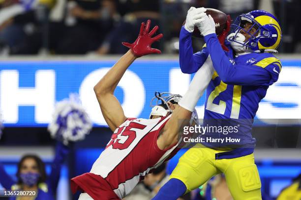 Donte' Deayon of the Los Angeles Rams breaks up a pass intended for Antoine Wesley of the Arizona Cardinals during the fourth quarter in the NFC Wild...