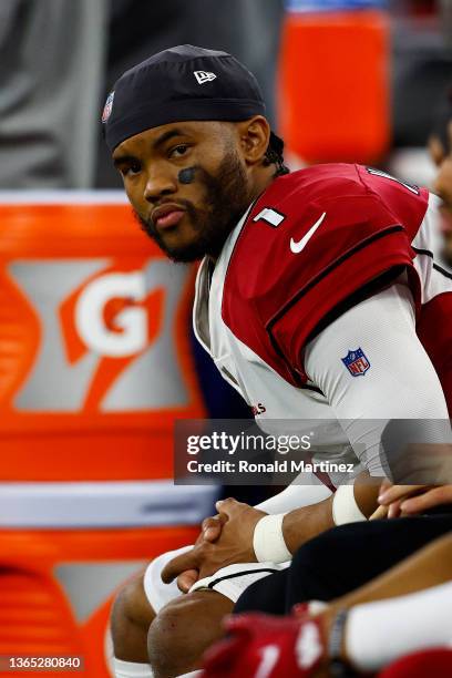 Kyler Murray of the Arizona Cardinals looks on from the sidelines against the Los Angeles Rams during the fourth quarter in the NFC Wild Card Playoff...