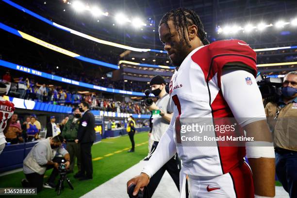 Kyler Murray of the Arizona Cardinals walks off the field after losing to the Los Angeles Rams 34-11 in the NFC Wild Card Playoff game at SoFi...