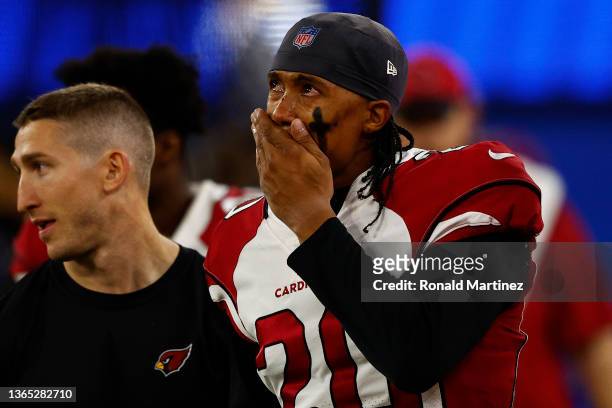Marco Wilson of the Arizona Cardinals reacts after a loss to the Los Angeles Rams 34-11 in the NFC Wild Card Playoff game at SoFi Stadium on January...